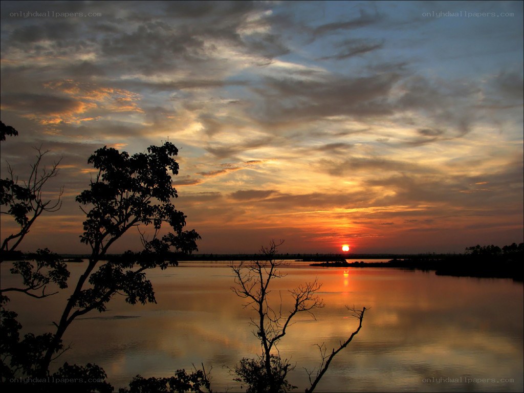 sunset over a calm lake