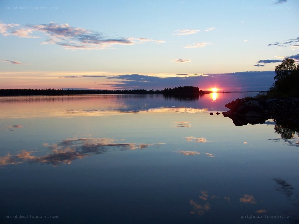 Sunset over a calm lake