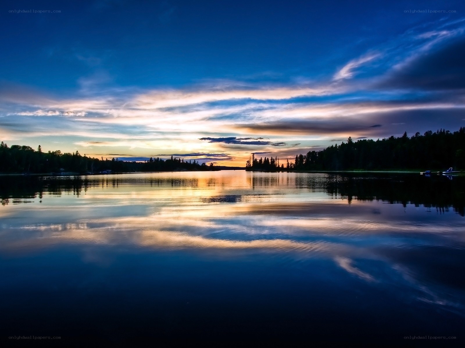 Sunset over a calm lake