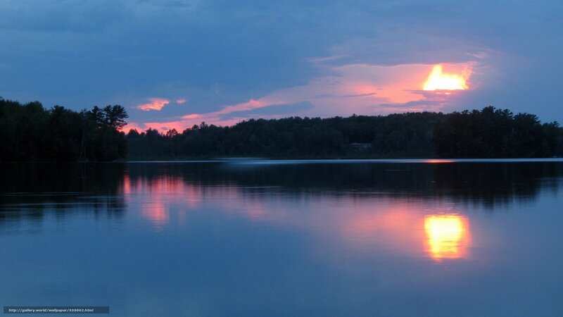 Sunset over a calm lake