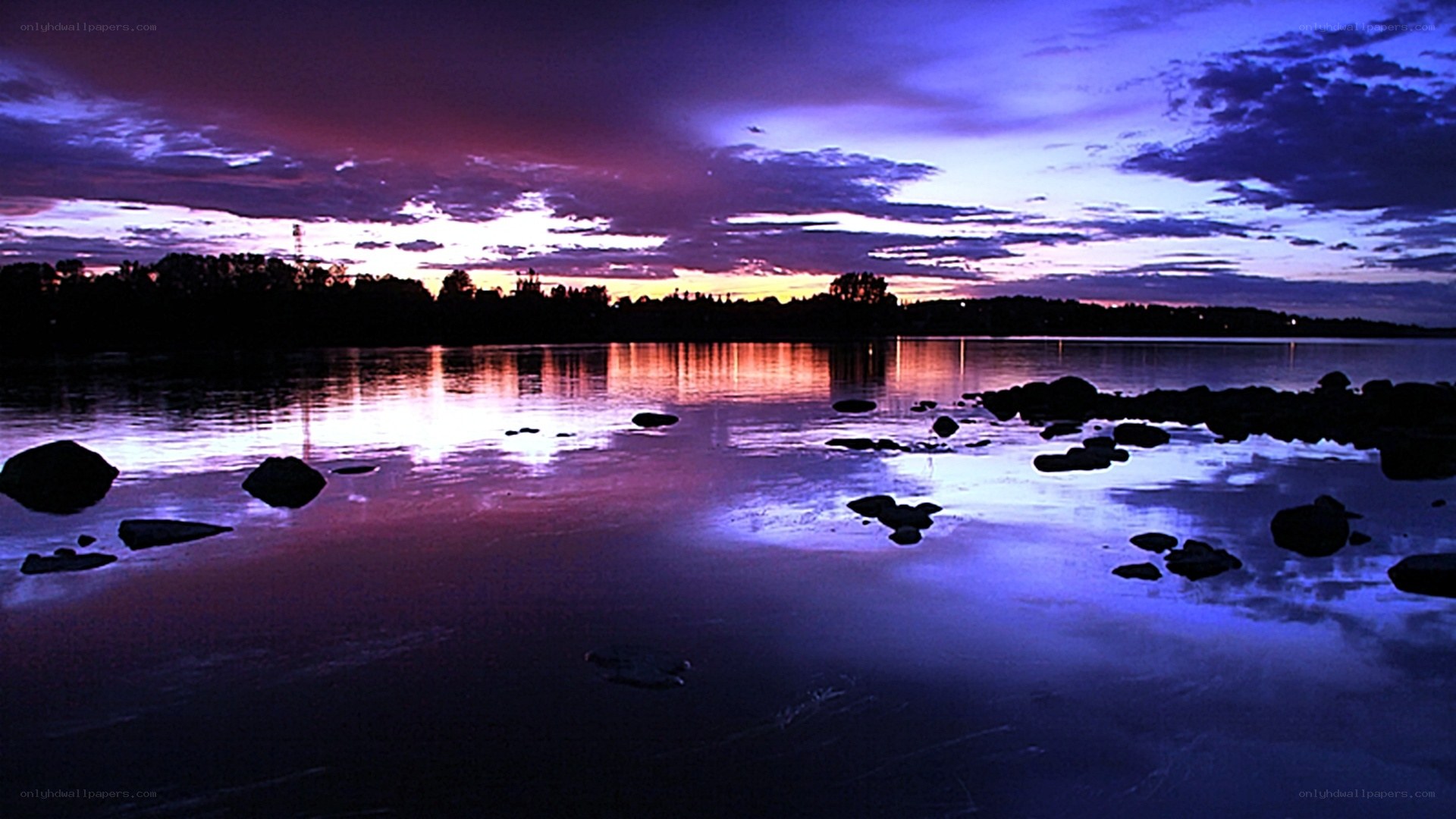 sunset over a calm lake