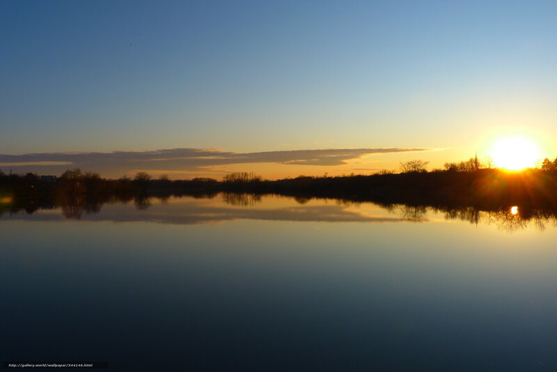 Sunset over a calm lake