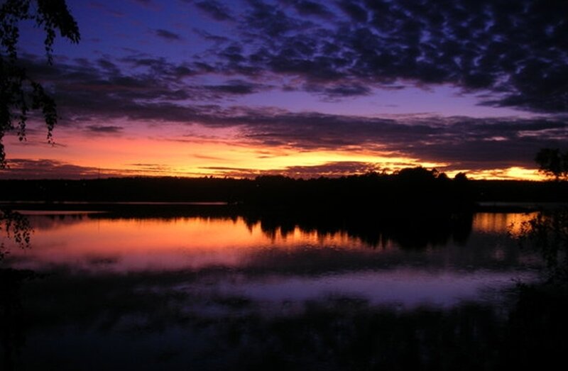 Sunset over a calm lake