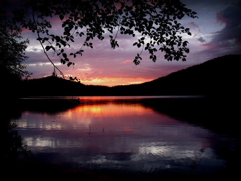 sunset over a calm lake
