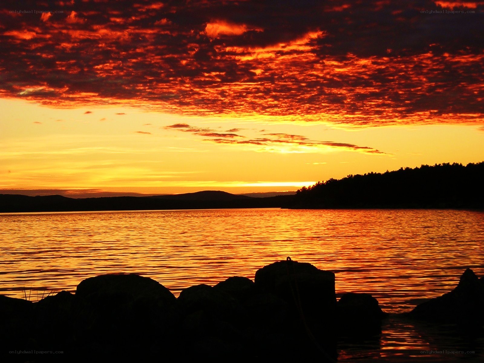 sunset over a calm lake