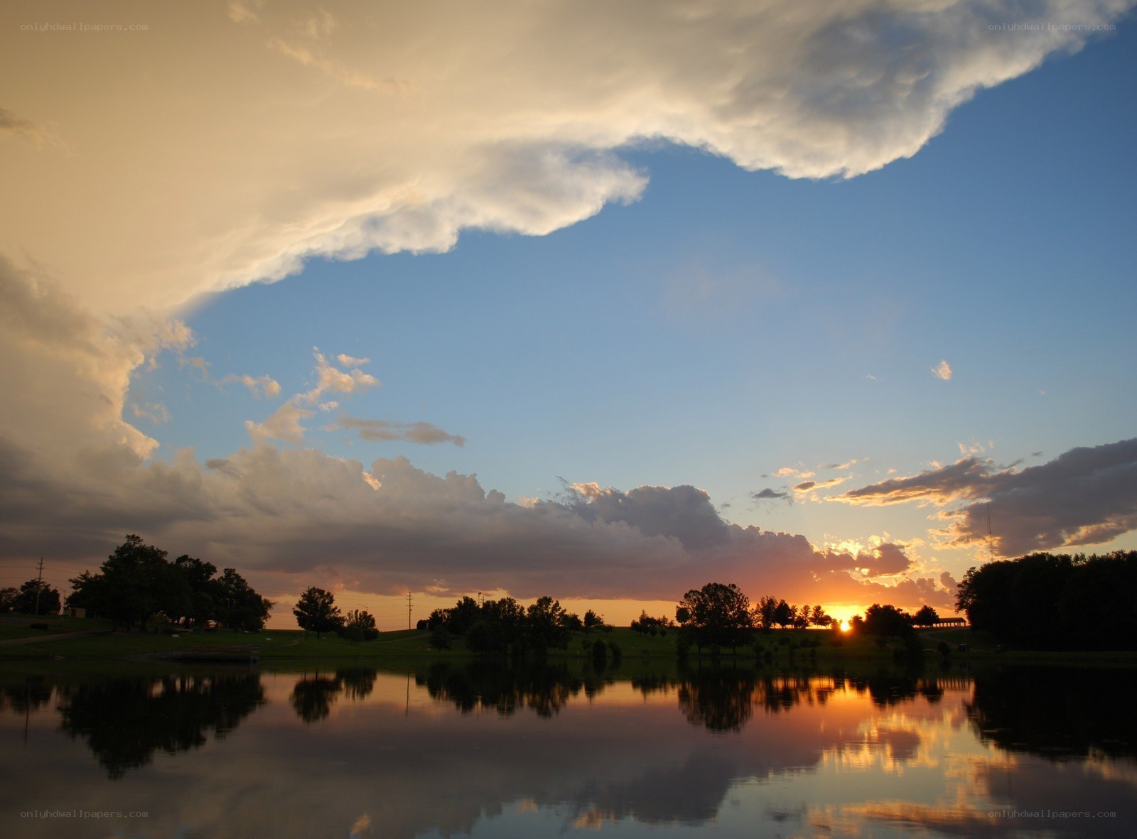 sunset over a calm lake