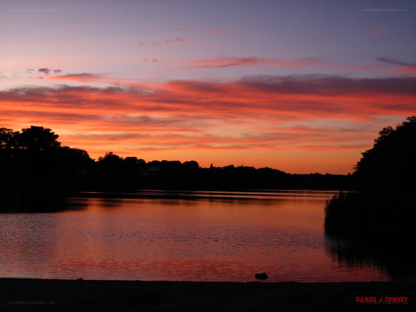 sunset over a calm lake