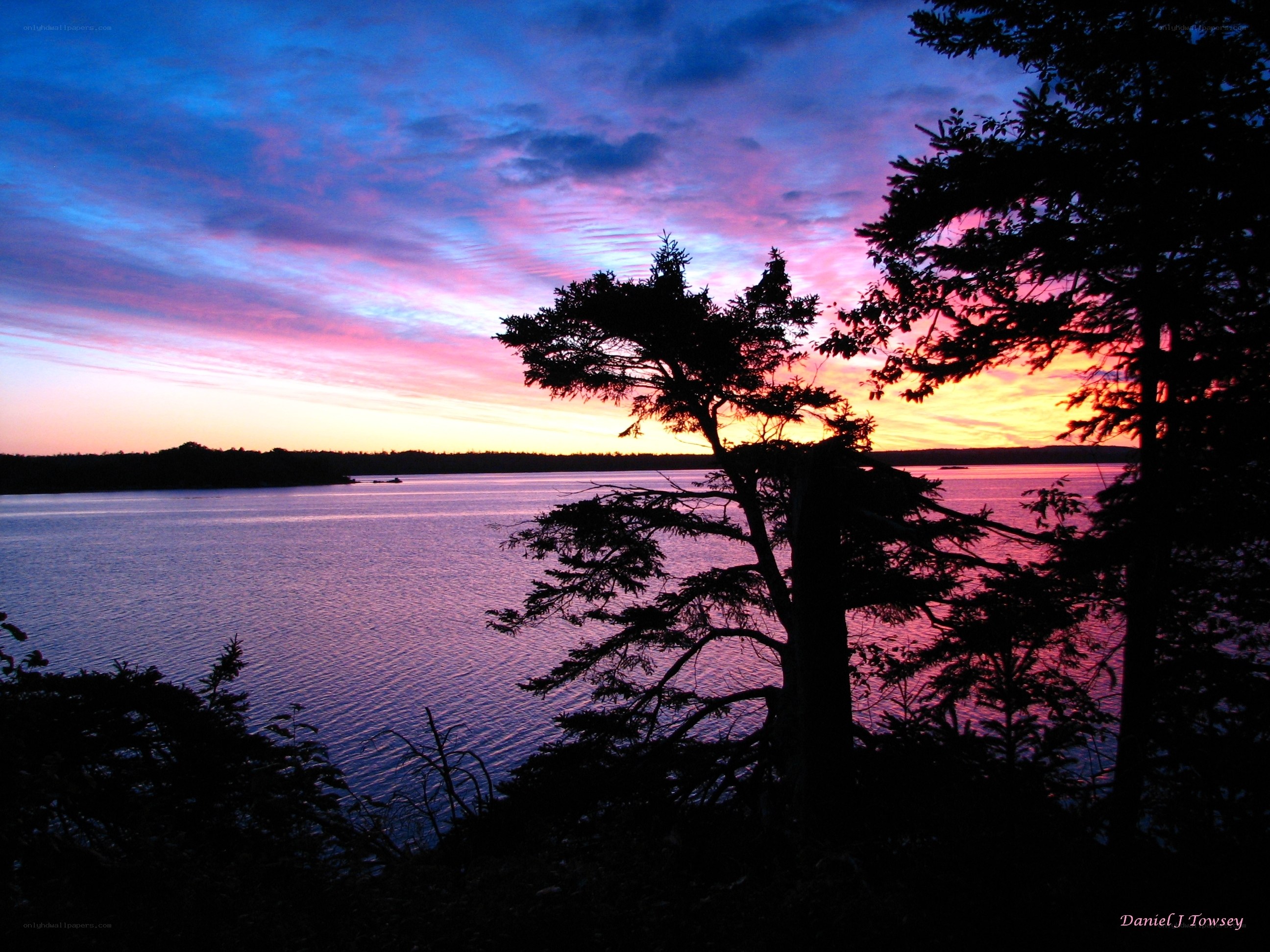 sunset over a calm lake