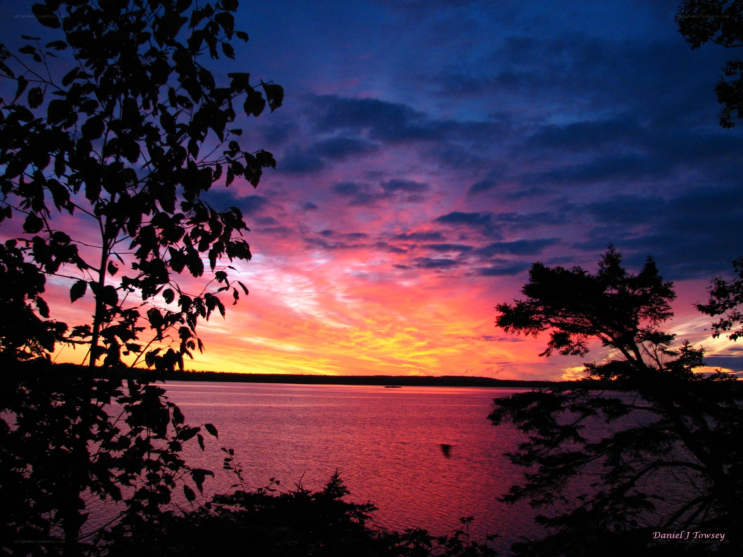 sunset over a calm lake