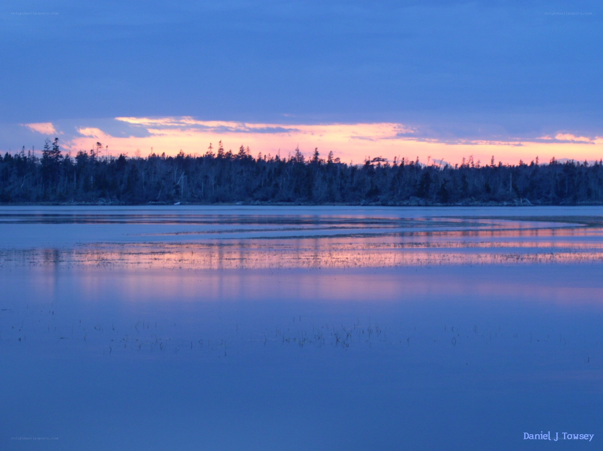 Sunset over a calm lake