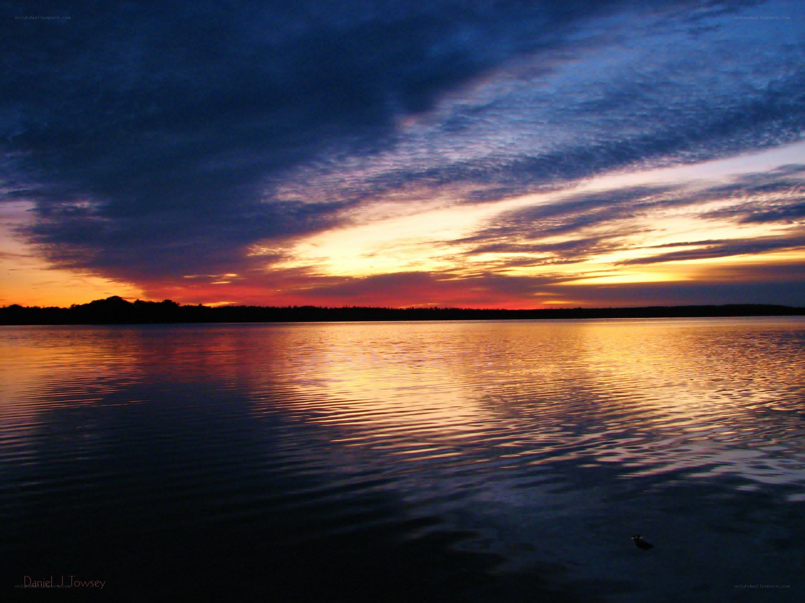 Sunset over a calm lake