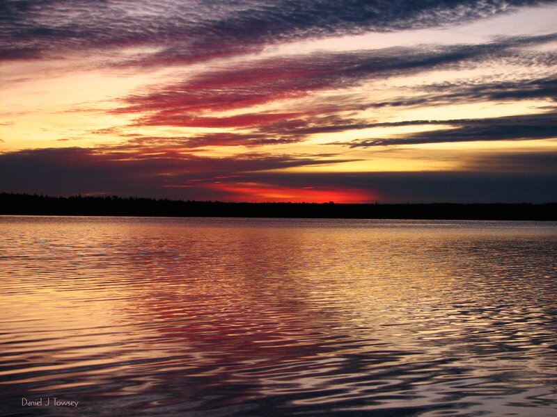 Sunset over a calm lake