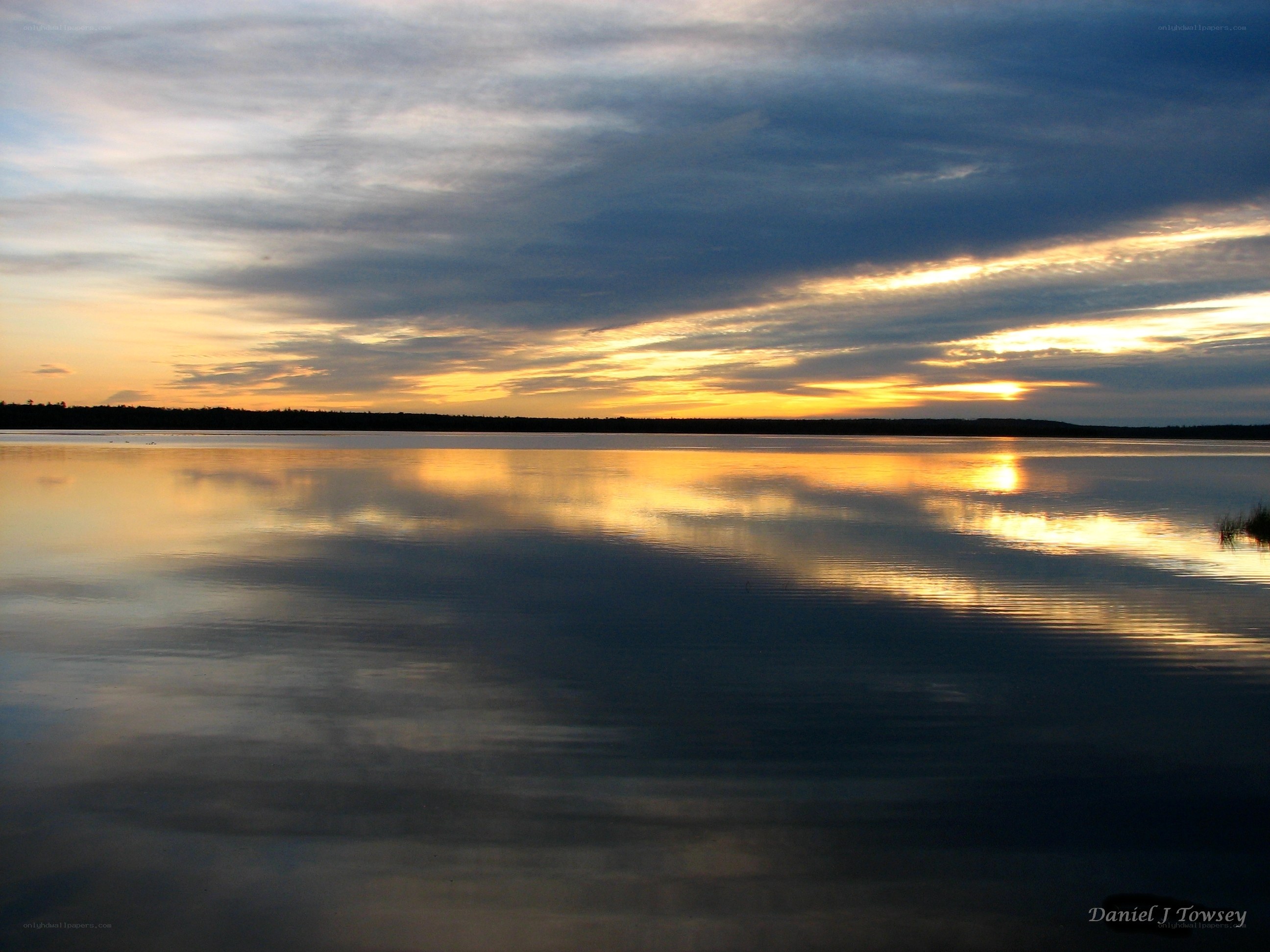 Sunset over a calm lake