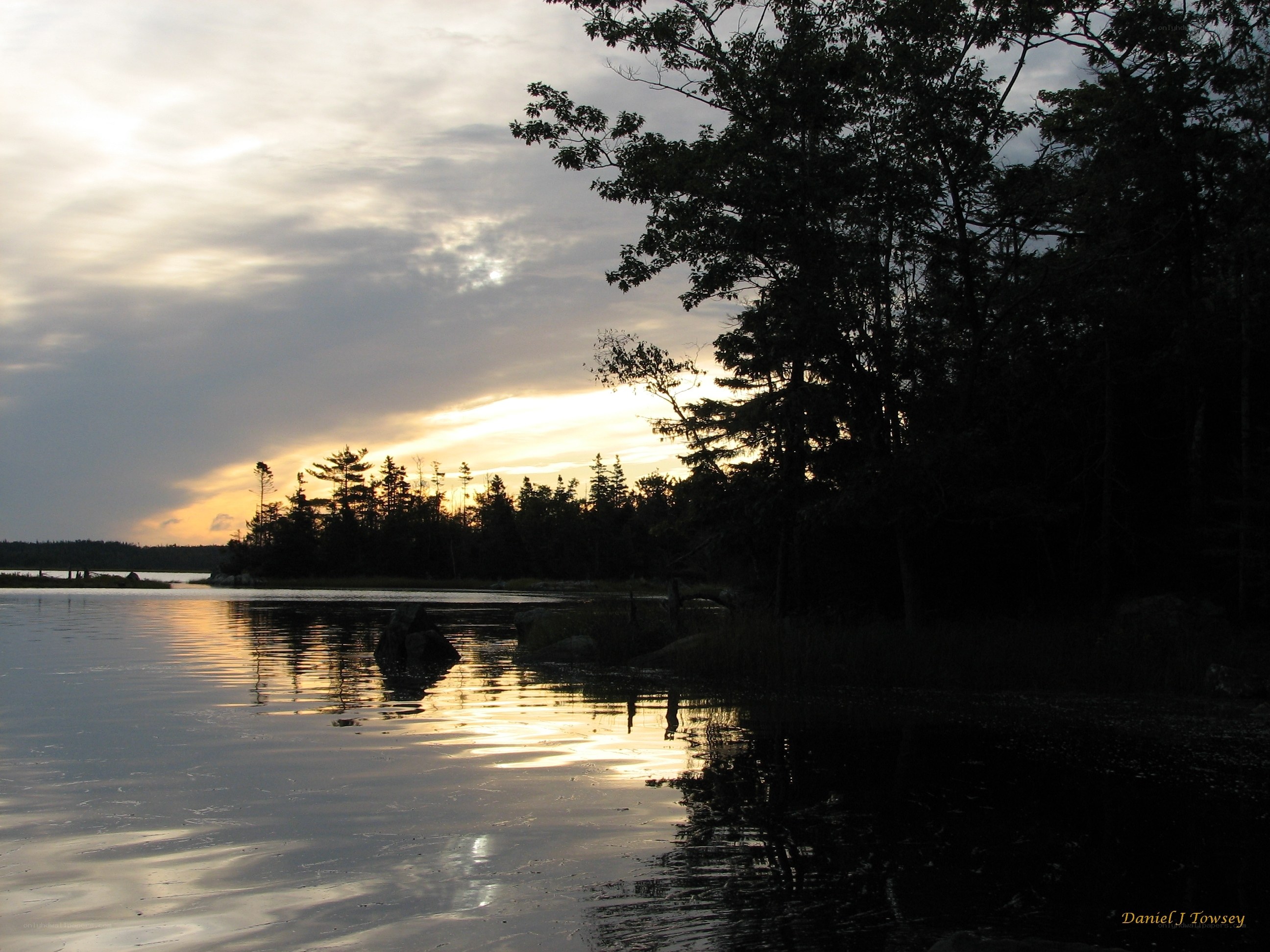 sunset over a calm lake