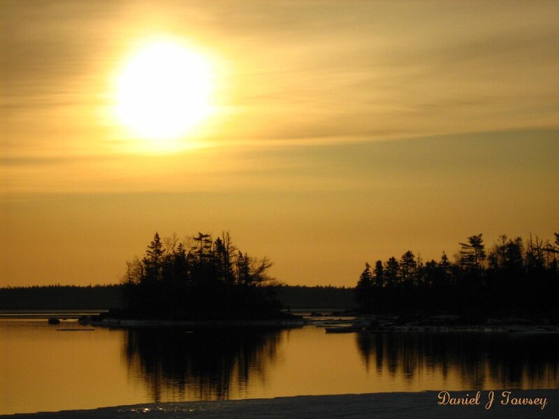 sunset over a calm lake