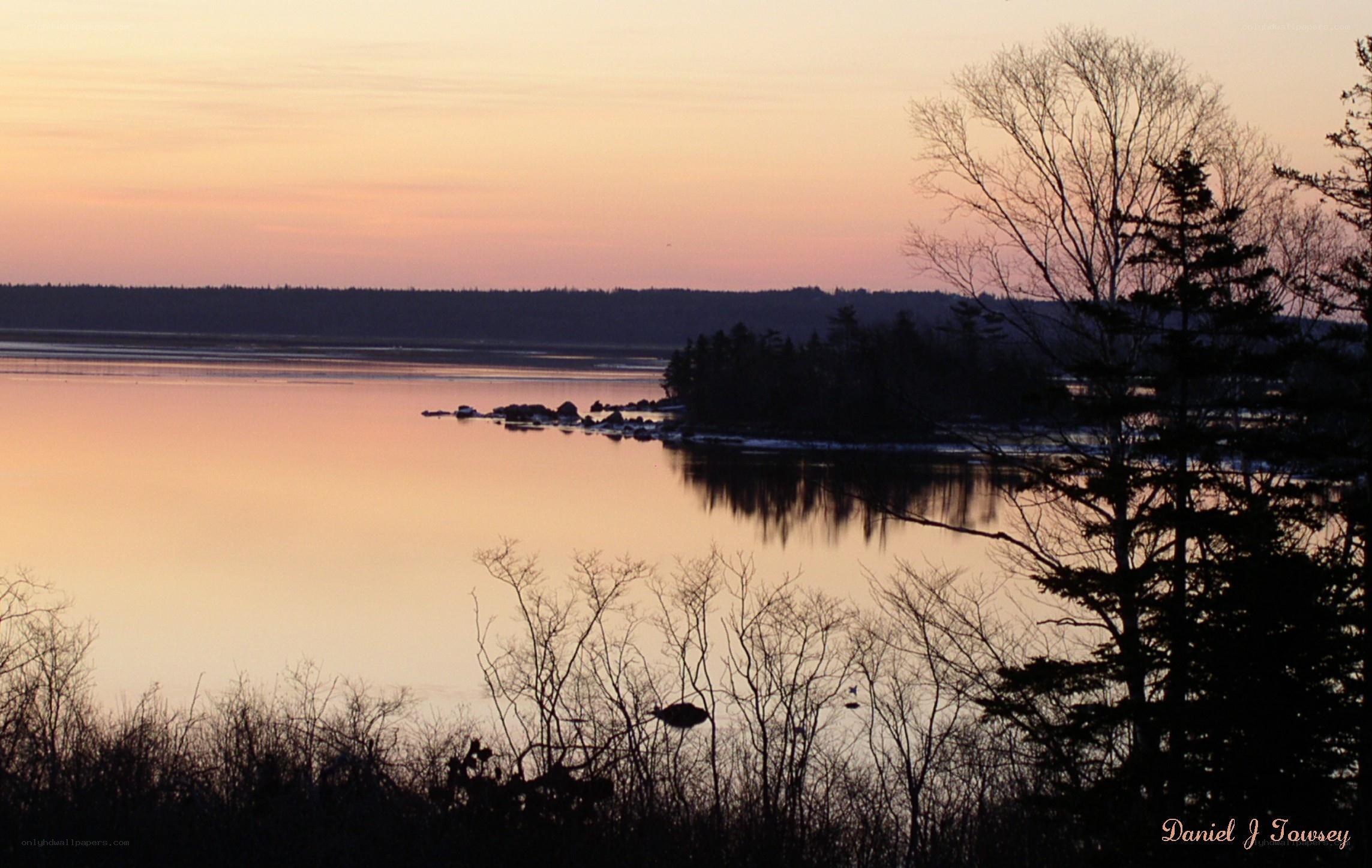 sunset over a calm lake