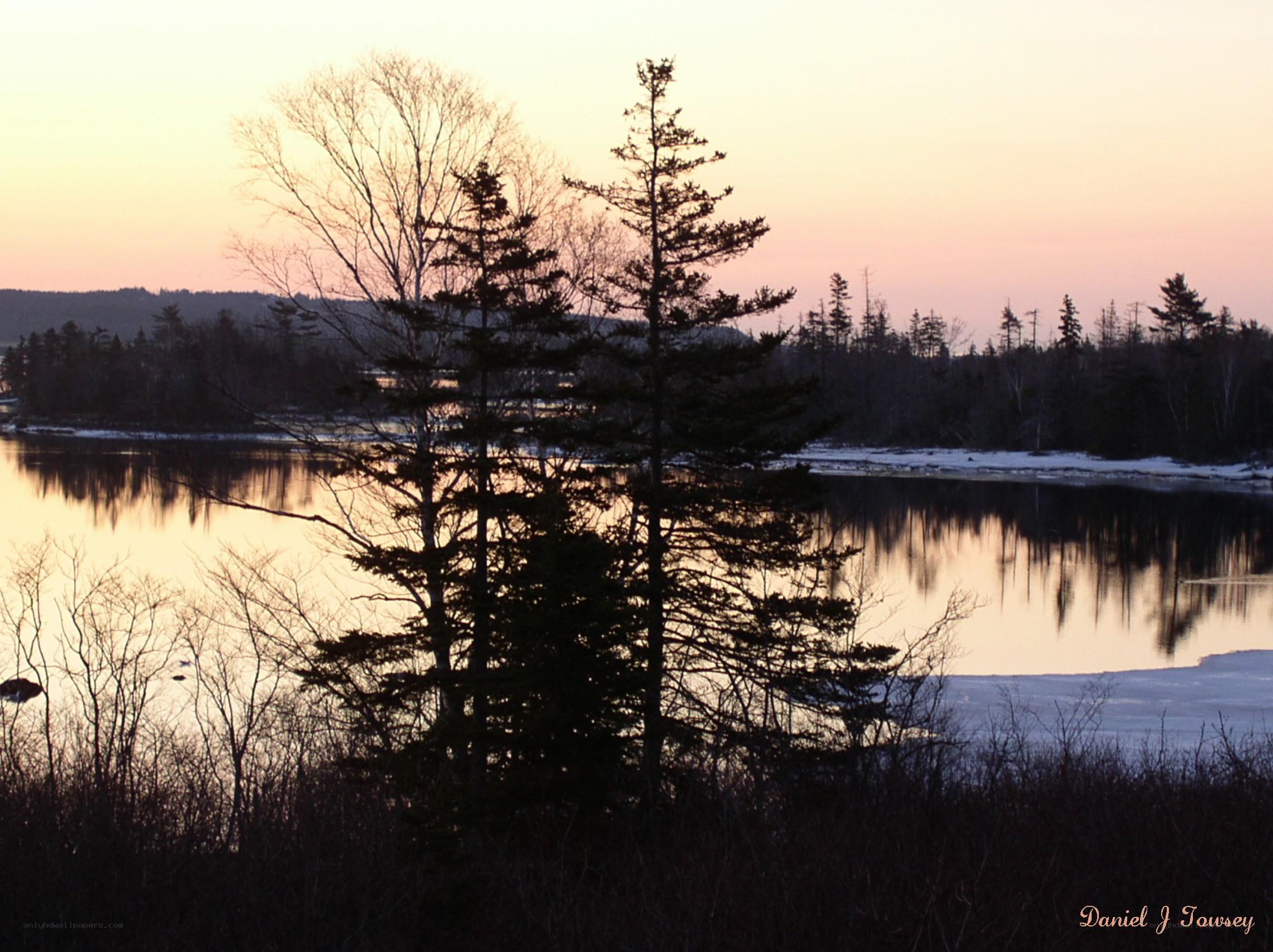 sunset over a calm lake