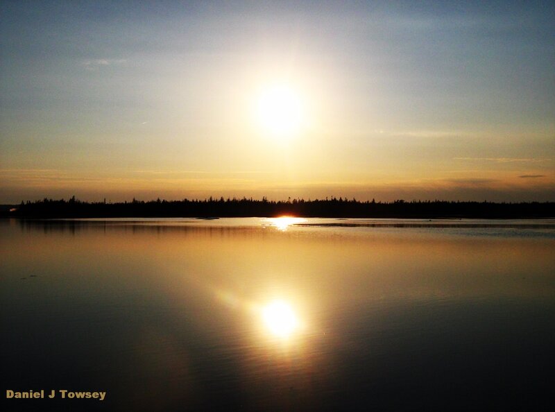 Sunset over a calm lake