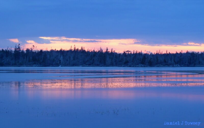 sunset over a calm lake