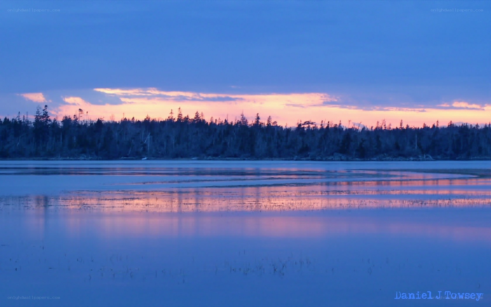 sunset over a calm lake