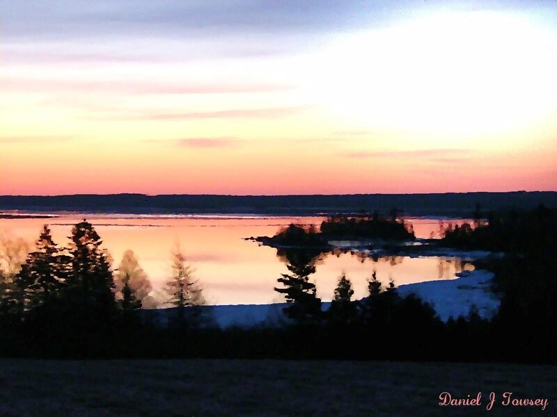 sunset over a calm lake