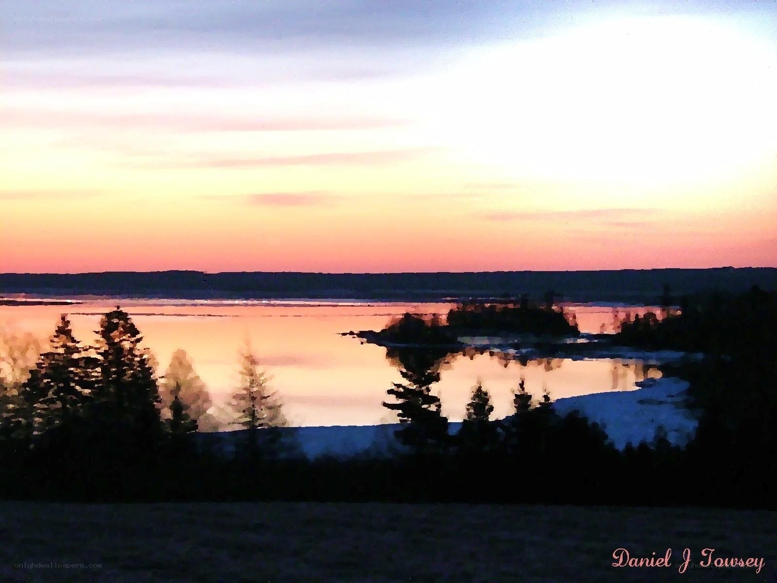 sunset over a calm lake