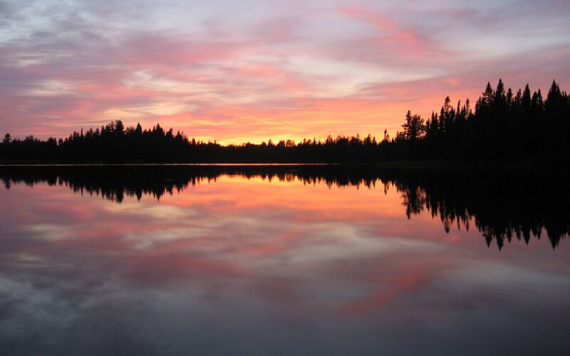sunset over a calm lake