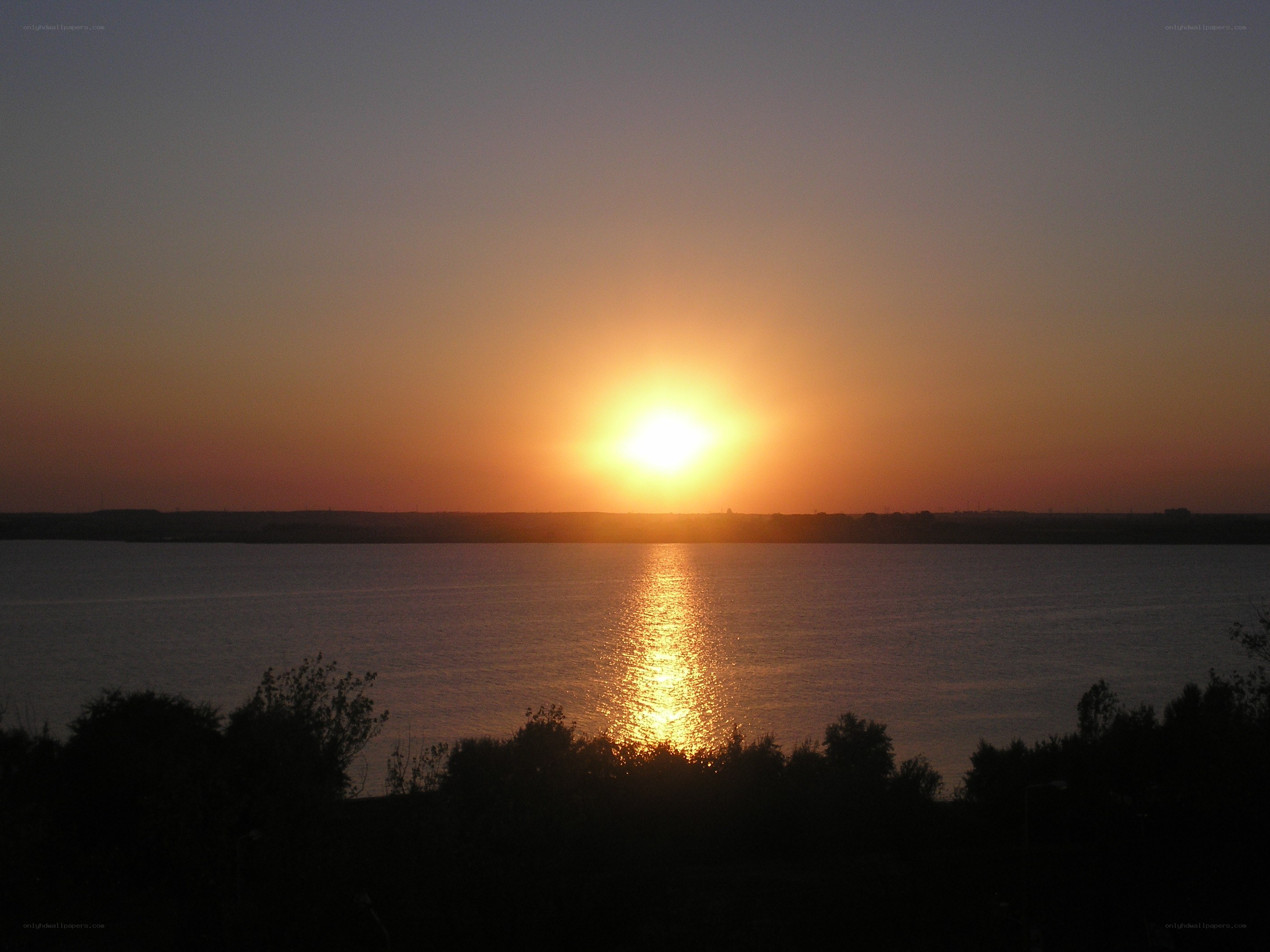 Sunset over a calm lake