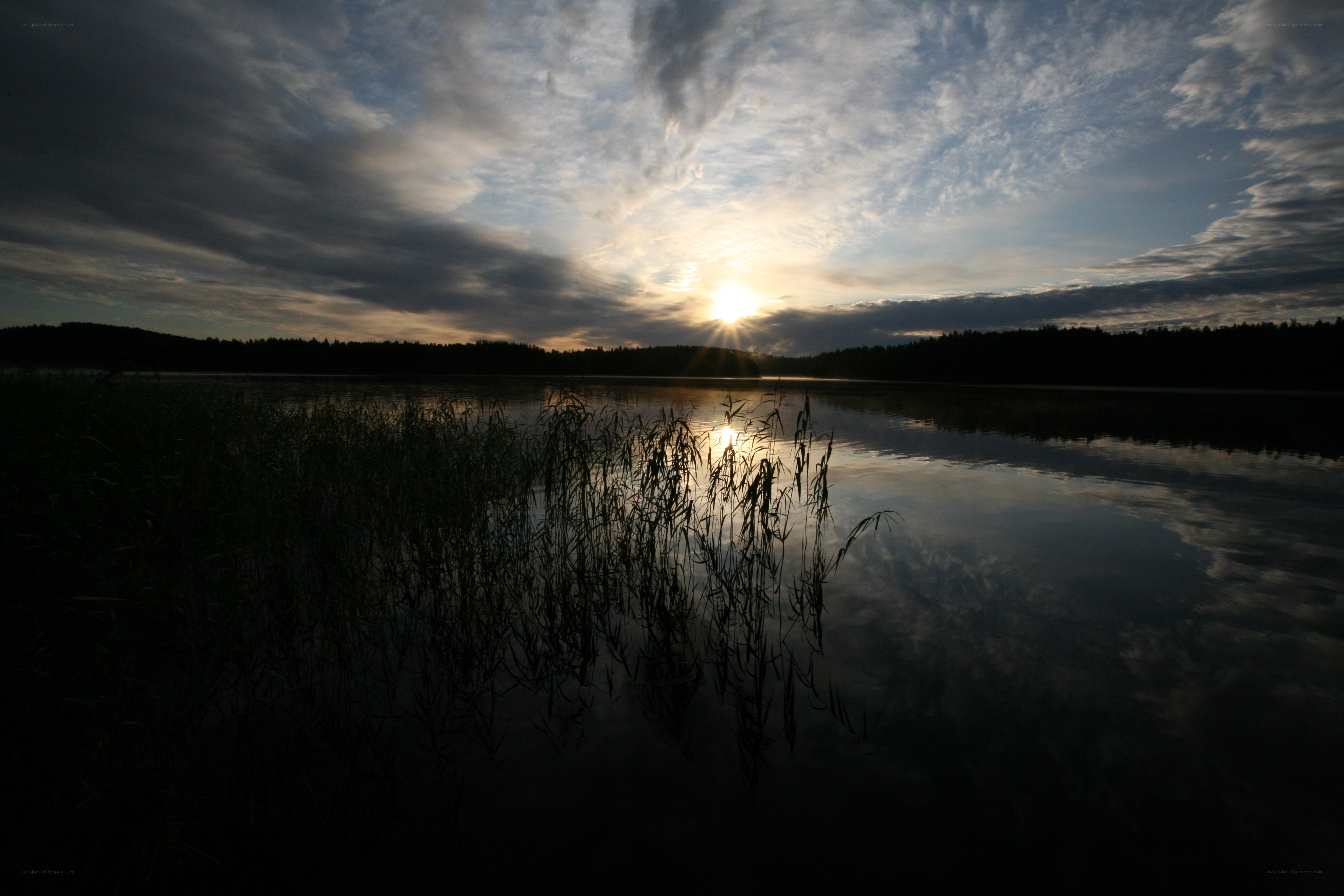 Sunset over a calm lake