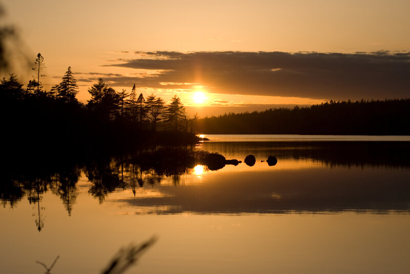 Sunset over a calm lake