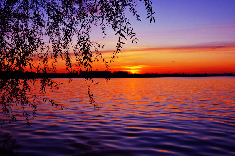 Sunset over a calm lake