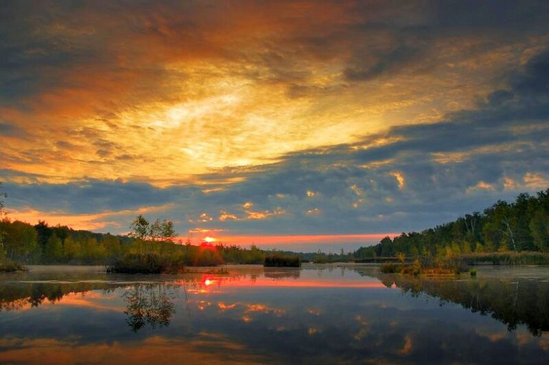 Sunset over a calm lake