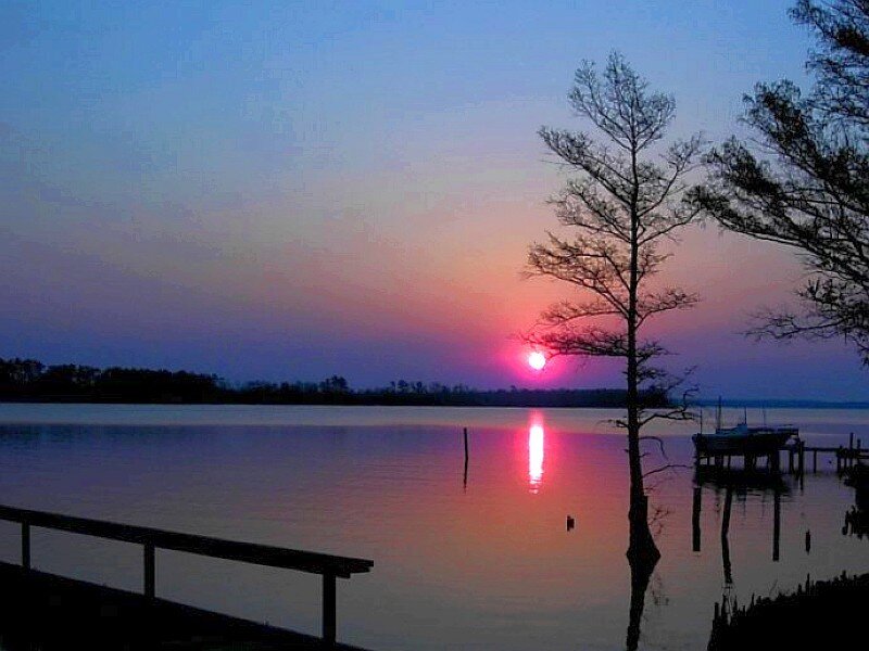 sunset over a calm lake