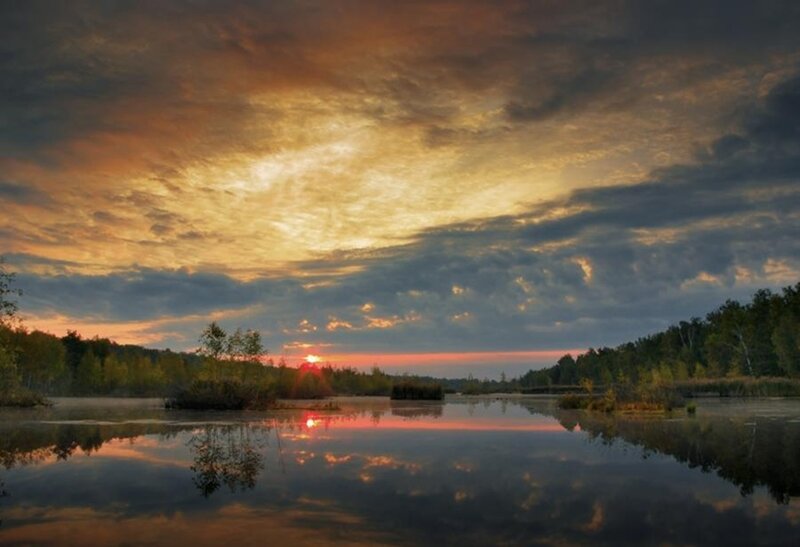 Sunset over a calm lake
