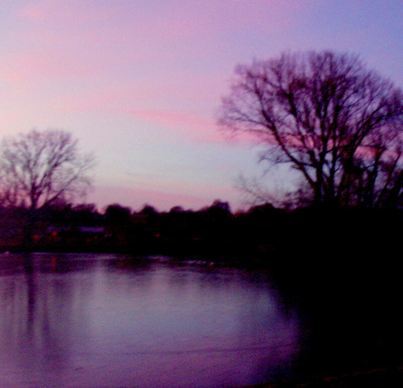 sunset over a calm lake