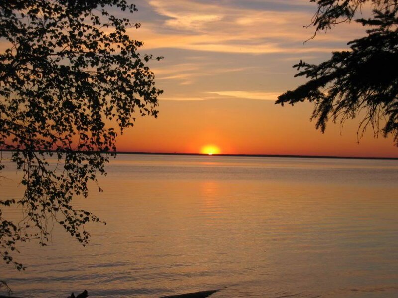 sunset over a calm lake