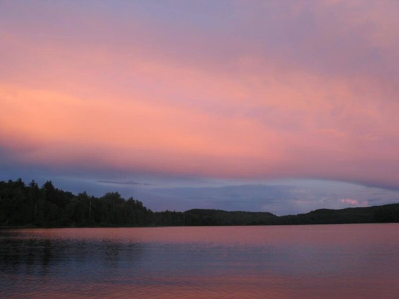 sunset over a calm lake