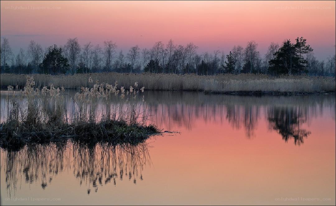 Sunset over a calm lake