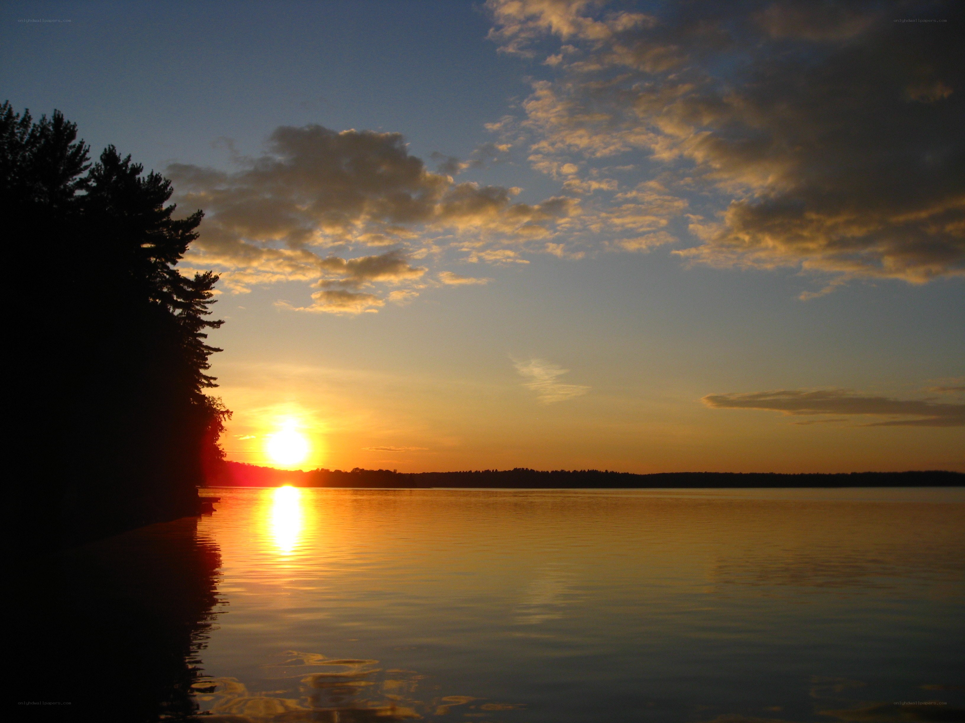 sunset over a calm lake