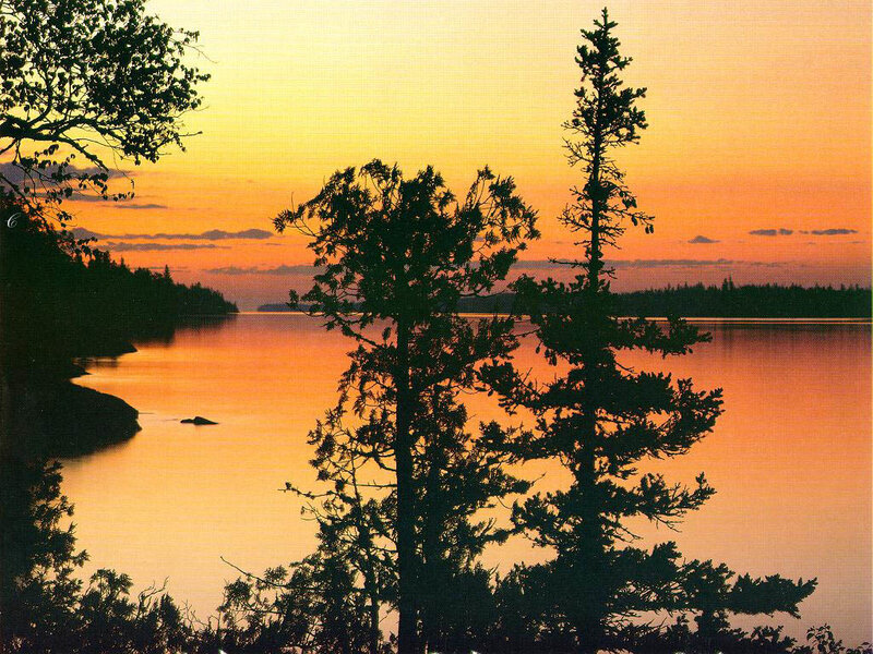 sunset over a calm lake