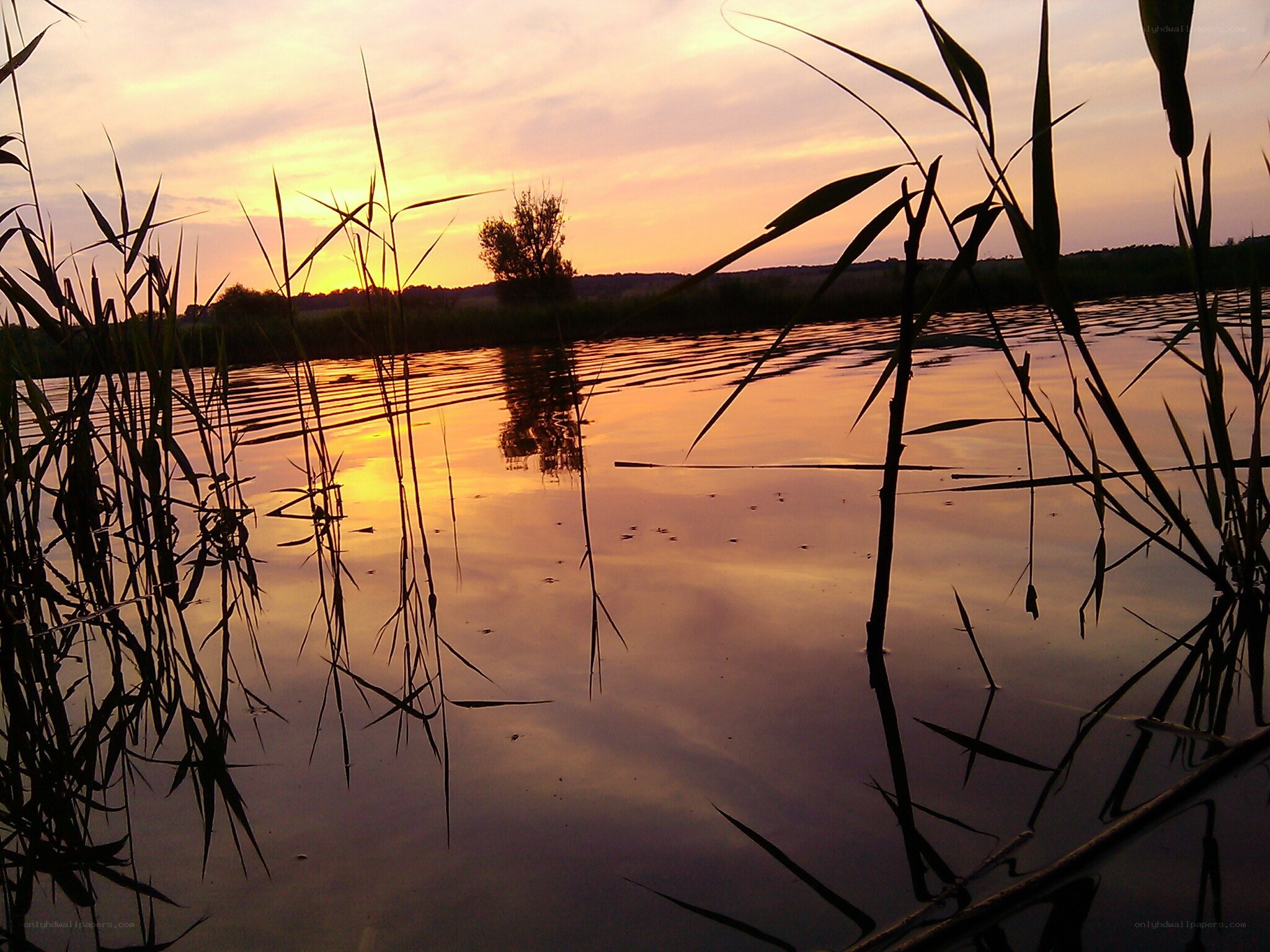 Sunset over a calm lake