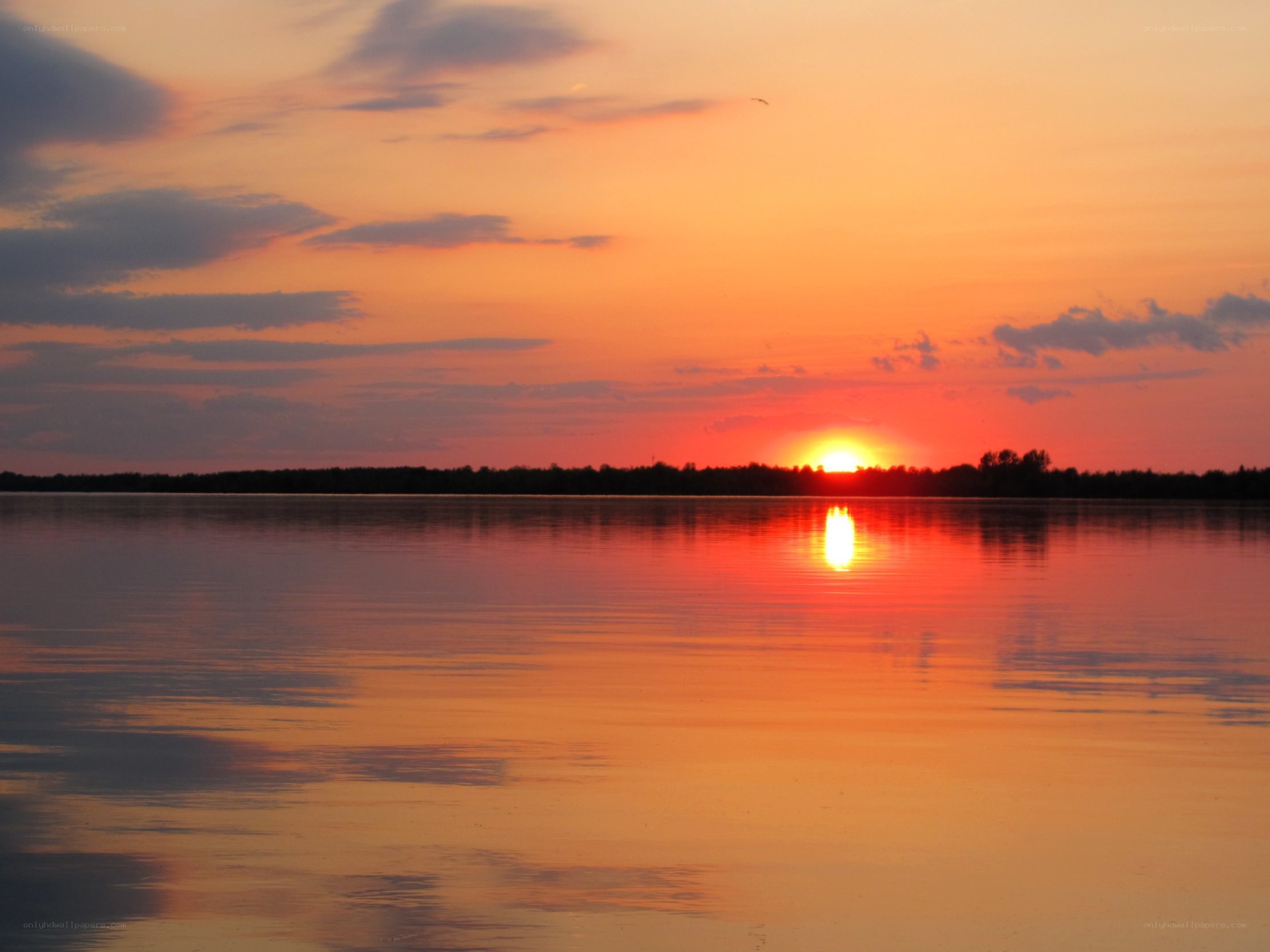 Sunset over a calm lake