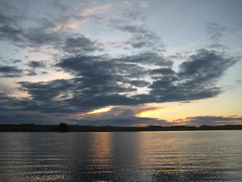 sunset over a calm lake