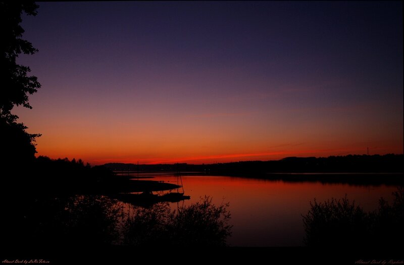 Sunset over a calm lake