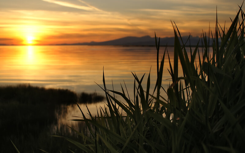 Sunset over a calm lake