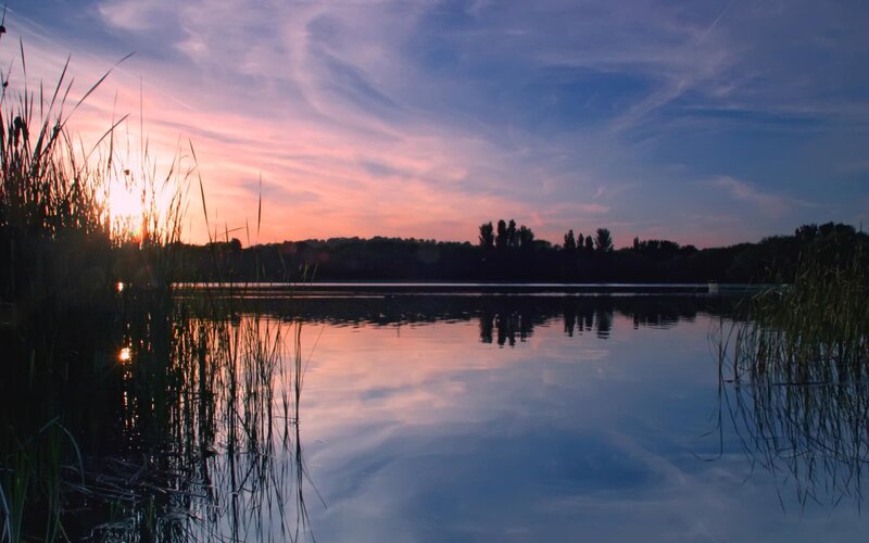 Sunset over a calm lake