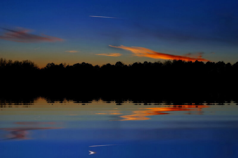 Sunset over a calm lake