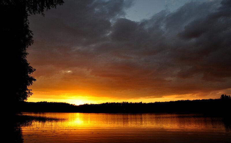 sunset over a calm lake