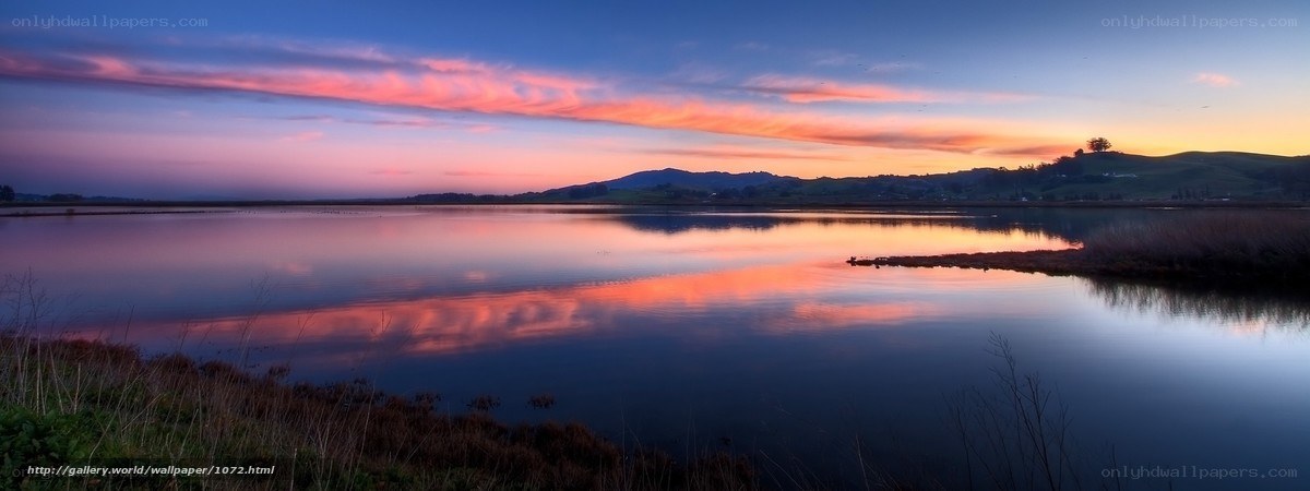 Sunset over a calm lake