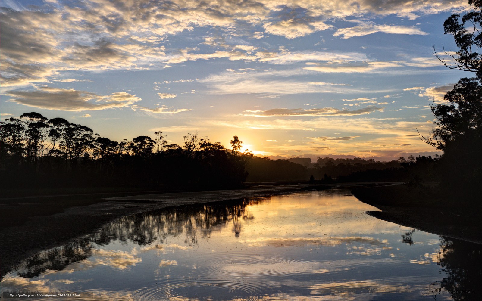 Sunset over a calm river